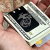 mini-VIPER Titanium Money Clip with the USMC Eagle Flag and Anchor design precision engraved into our black diamond finish.  Officially licensed by the United States Marine Corps.